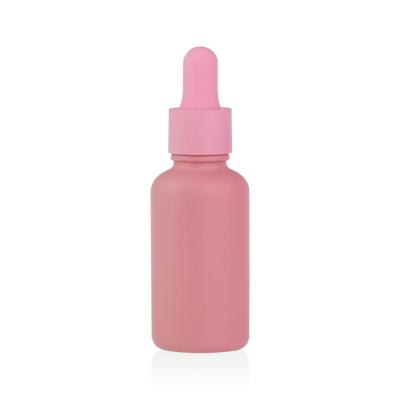 China Cosmetics Round Shape 15ml 20ml 25ml 30ml 50ml Frosted Pink Dropper Bottle For Essential Oil for sale