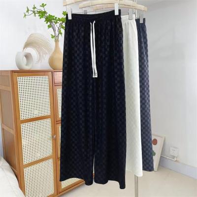 China 2022 New Arrivals Breathable Thick And Shear Long Leg Black Color Wide Leg Pants With Loose Drawstring Women Pants for sale