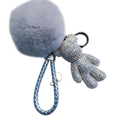 China Fluffy Ball Dangling Crystal Rhinestone Pom Pom Keychains Cartoon Bear Charm Keychain High Quality Durable for sale