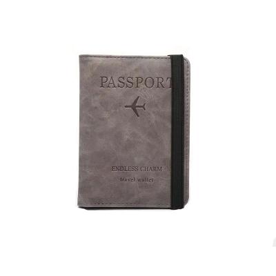 China 2022 Fashion 7 Colors Passport Cover RFID Blocking Passport Holder Elastic Band Travel PU Leather Passport Holder for sale