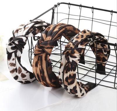 China Fabric Factory Outlet Animal Leopard Hair Circle Knot Headband For Women for sale