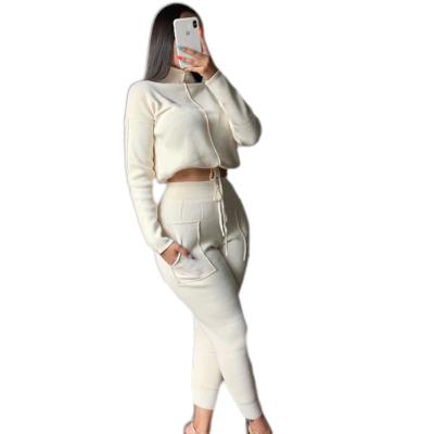 China Autumn new breathable fashion women's high collar pocket of clothing sports two-piece sheer long sleeve pants color set casual suit. for sale