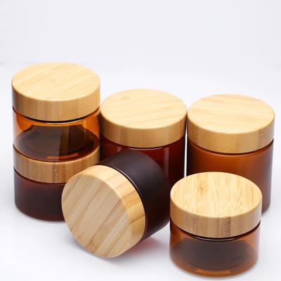 China 250g Cosmetic Wooden Bamboo Packaging Covers Bamboo Lid Empty Jar Jar Maker PET Cosmetic Jar for sale