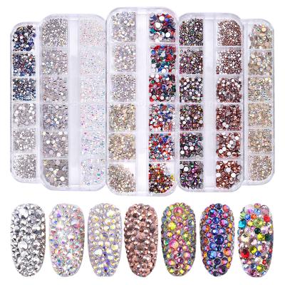 China 3D Art Rhinestone 3D Flat Bottom Size Mixed Dazzle Diamonds ab Crystal Flat Back Clear Rhinestone Nail Art Decoration in Wheel for sale