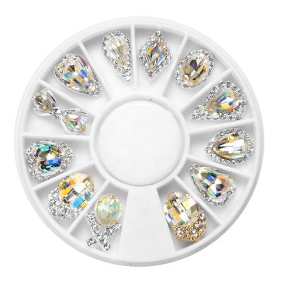 China Crystal Stone Glitter Jewelry Trending Nail Wheel Shaped Nail Gems DIY Luxury Rhinestone 3D Crystal Design Nails Rhinestone for sale