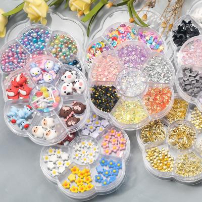 China Christmas Nail Charms Wholesale Package Nail Jewelry Butterfly Kawaii Nail Charm Backs Rhinestone Nail Charms Set for sale