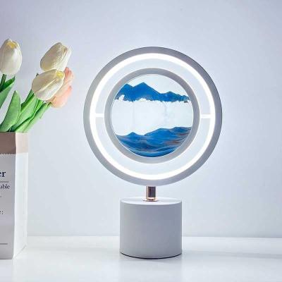 China Modern Promotional Smart Moving Pattern Lamp Sand Lamp Bedside Table Modern Dim Sales Table Lamp for sale