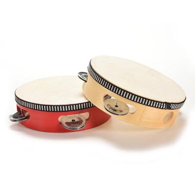 China Double Row Plastic Wooden Hand Held Tambour Basque Set for sale