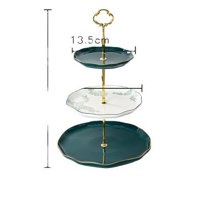 China Sustainable Light Luxury Ceramic Fruit Dish Dessert Candy Dish Living Room Home Three Layer Snack Rack for sale