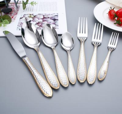 China Sustainable Wholesale Corrugated Handle Western Food Luxury Royal Cutlery Set Stainless for sale