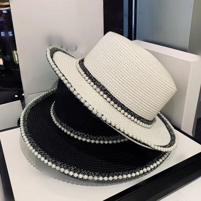 China Luxury Fashion Pearl Jazz Straw Hat For Women Fashion Flat Top Summer Picture Hat for sale