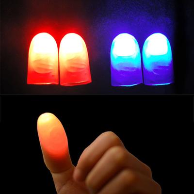 China Rubber Thumb With Light Toys Magic Tricks Props Funny Flashing Magic Glowing Fingers Toys for sale