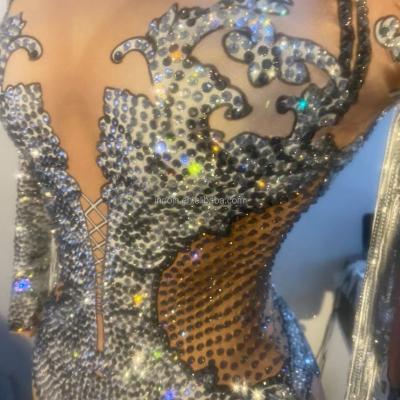 China Sexy Performance Costume Latin Dance Bar Singer Transparent Mesh Leotard Stage Wear Stretch Rhinestone Tassel Jumpsuit for sale