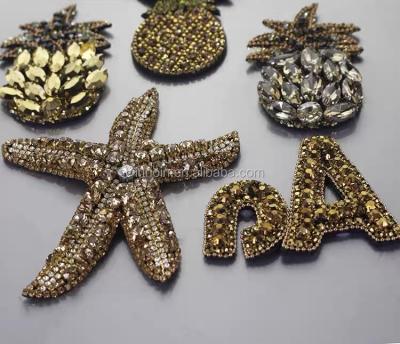 China Viable Hand Do Rhinestone Beaded Fringe Sequin Patches Sew On Crystal Pearl Patch For Clothes For Sale for sale