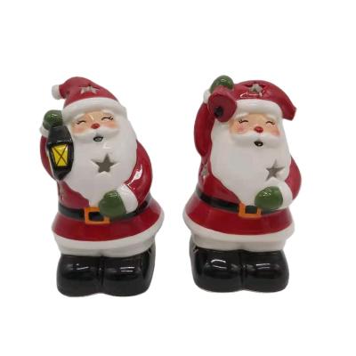 China New Europe Christmas Snowman Decorative Ceramic Figurine For Christmas Santa With Led Light 2022 Holiday Decoration for sale