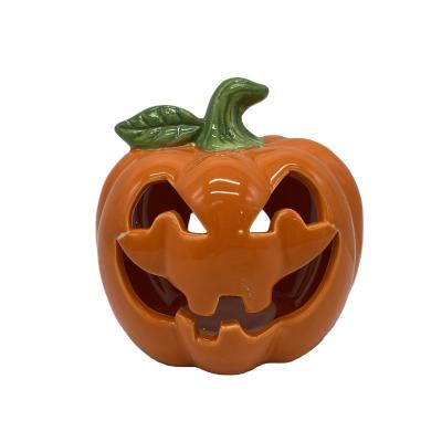 China Hot Sale Ceramic Decor Halloween Ornaments Party Gifts Halloween Pumpkin Tealight House For Party Decorations for sale