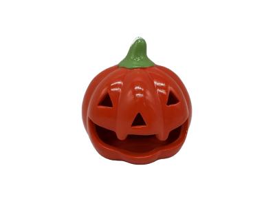 China Europe Best Selling Gifts And Crafts Festical Ceramic Small Ornament For Halloween Decoration Pumpkin Tealight House for sale