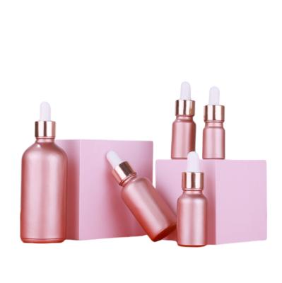 China Non Puddle Ladies Perfume Essential Oil Bottle Luxury Rose Red Glass Dropper Bottle With Customized Dropper for sale