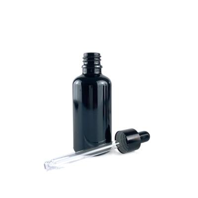 China Non Puddle Sizes Natural Black Glass Dropper Essential Oil Bottle With Black Lid For Serum for sale