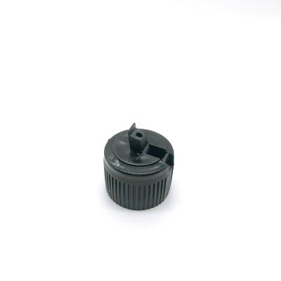 China Non Spill Screw Tube Flip Top Cap Black Plastic Snap On Flip Top Cap With Silicone Valve for sale