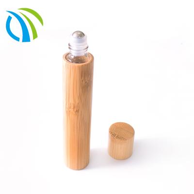 China Non Spill Bamboo Essential Oil To Use 5ml 10ml 15ml Eye Cream Glass Roll On Bottle With Stainless Lid And Metal Roll Balls for sale