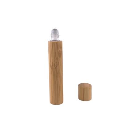 China Non Spill 10ml Roll-On Sheath Bamboo Bottle With Small Dosage For Essential Oil Perfume Bottles for sale