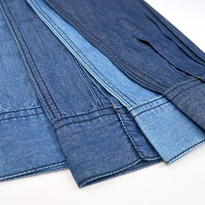 China 4.5oz Denim Fabric Breathable Cotton Lattice Fabric Cheap Price Cloth Roll 100% FLAVOR INDIGO DYEED TWILL for sale