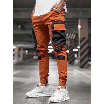 China 2020 New Anti-wrinkle Amazon Autumn Men's casual sports pants parride woven pocket beam foot stitching casual pants for sale