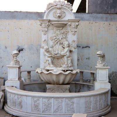 China Small Angel With Lion Dolphin Water Fountains Modern Outdoor Natural Marble Stone Garden Statue Decoration for sale