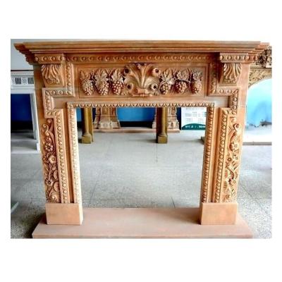 China Modern warm natural marble surround handmade carved fireplace mantel for sale