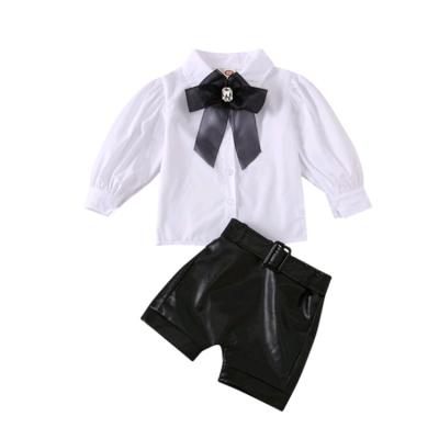 China Comfotable 2021 new fashion puff sleeve shirt white and black leather shorts two-piece children girls clothes set for sale