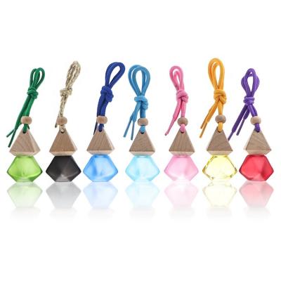 China Car Air Freshener Overstock Perfume Essential Oil Car Diffuser Eco-friendly Hanging Glass Bottle 8ml 10ml for sale