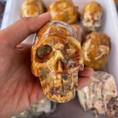 China Wholesale Natural Europe Crazy Lace Agate Carving Skulls For Decoration Souvenir Gift for sale