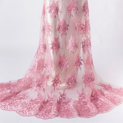 China Wholesale handmade chemical water soluble pink rosette design lace large and exquisite mesh embroidery sequin fabric for bride dress for sale