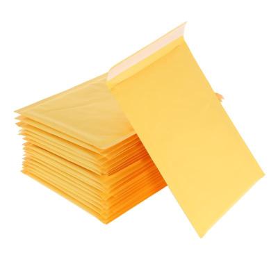 China Business& 550pcs/lot Yellow Bubble Shopping Kraft Ads Shipping Padded Envelopes Durable Redi-Stripe Peel Off Closure for sale