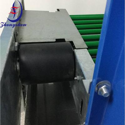 China Noise Reducing Black Rubber Roller For Layer Chicken Cage Egg Conveyor System for sale