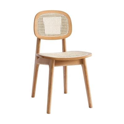 China Cooling Natural Rattan Dining Chair Popular Nordic Style Water Rattan Indonesian Ash Wood Rattan Seat Dining Chair for sale