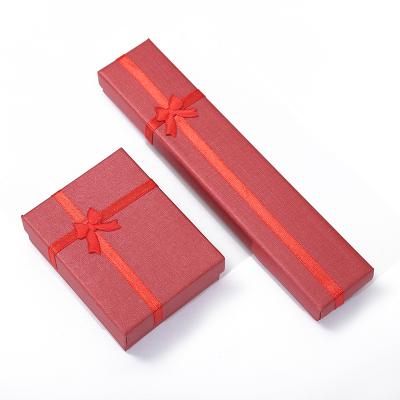 China Jewelry Packaging Logo Bow Red Jewelry Boxes Custom Made With Foam Insert Trinket Box Drawer Jewelry Paper Boxes for sale