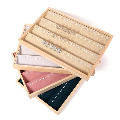 China Fashion Luxury Elegance Simplicity Canvas Jewelry Storage Box Bamboo Wood Border Wholesale Ring Earrings Jewelry Display Tray for sale