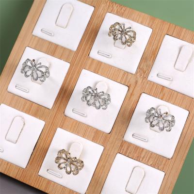 China Exquisite Fashion Small Ring Display Stand Solid Wood Ring Jewelry Display Tray Jewelry Storage Display for sale