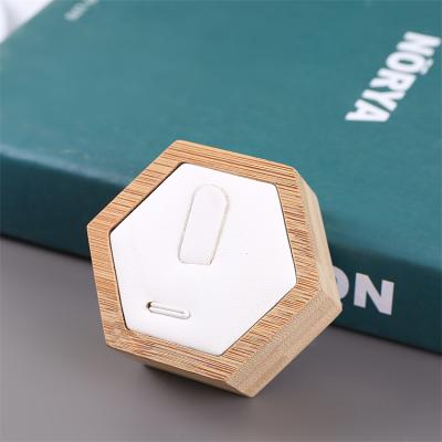 China Fashion Exquisite Simple Elegance Hexagon Ring Display Stands Natural Wood Luxury Mini Plate For Jewelry Display for sale