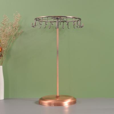 China Custom Jewelry Display Rack 23 Hooks Rotating Metal Necklace Display Stand Jewelry Rack Holder Display for sale