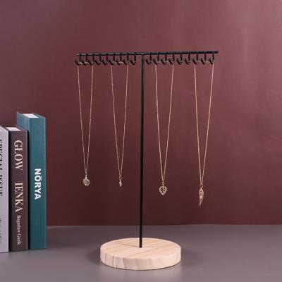 China Retail Jewelry Display Metal Jewelry Display Necklace Bracelet Holder Display Furniture With Wooden Base 19 Hooks for sale