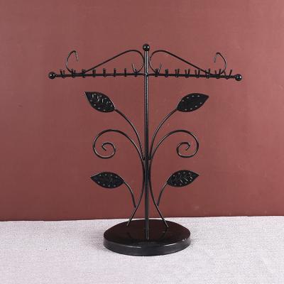 China Jewelery Display Jewelry Display Stand 32 Holes with Double Side Hook Holder for Bracelet Necklace Earring Stud Unique Metal Jewelry Displays for sale