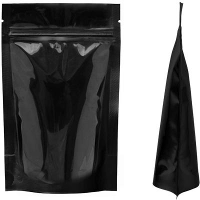 China Low moq moisture proof stand up vacuum bag stock black aluminum foil bag with zipper for sale