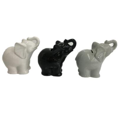 China Souvenir Factory Custom Exquisite Ceramic Elephant Piggy Bank To Give Children The Best Gift Coin Bank for sale