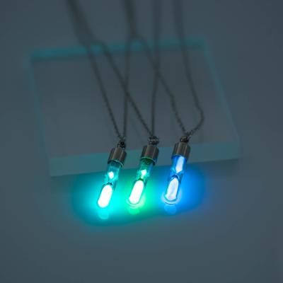 China 2020 Fashion TRENDY Hourglass Luminous Pendant Necklace Glowing In The Dark Cavity Luminous Pendant Necklace Jewelry Halloween Gifts for sale