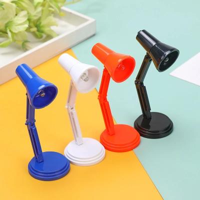 China Hot Student Reading Light Portable LED Color Folding Desk Lamp Modern Creative Mini Children's Eye Protection Cut Out Small Night Light for sale