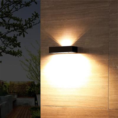 China Solar Garden LED Wall Lamp Outdoor Waterproof Glow Through Street Garden Garage Aluminum Energy Saving Solar Powered Light Lamps for sale