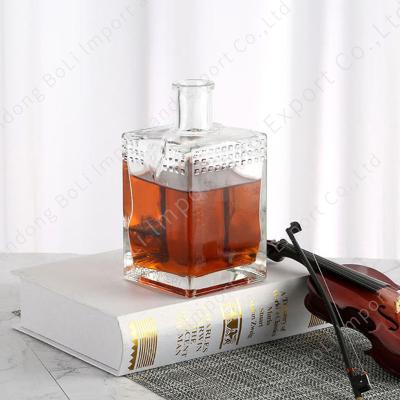 China Super Beverage Flint Liquor Bottle Cap 500ml Designer Liquor Bottles Round Liquor Bottle for sale